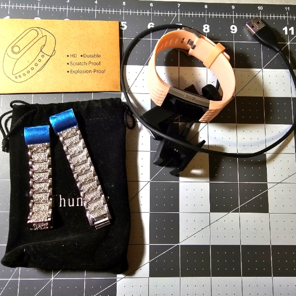 FitBit charge 2 pink M with extras Silvertone band and screen protectors
